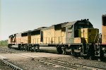 Chicago & Northwestern SD60 #8052 (with SD60M #6102) in the consist of a westbound passing the depot 